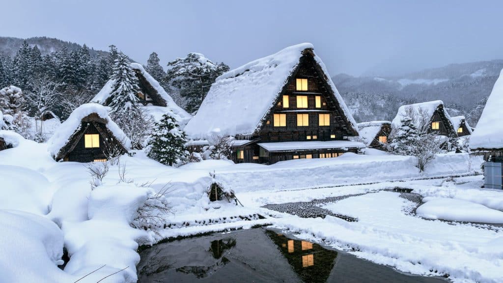 Thatched farmhouses under deep snow at Shirakawa-go in winter