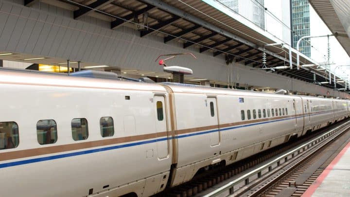 Shinkansen bullet train waiting at a Tokyo Station platform