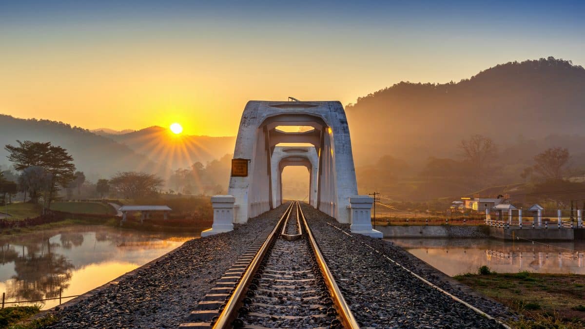 Tha Chomphu White Bridge in Lamphun at sunrise, on the Northern Line to Chiang Mai