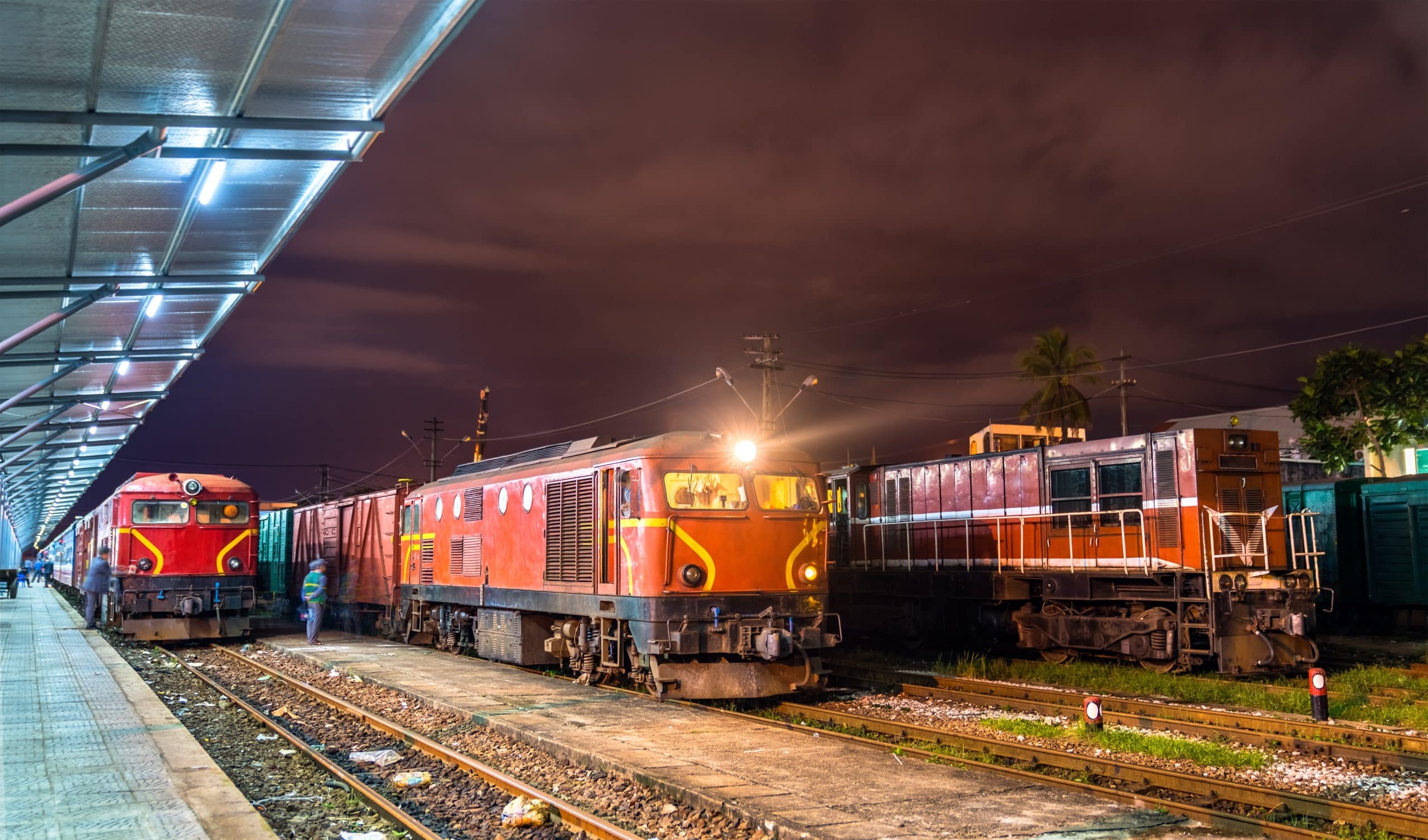 Passenger and freight locomotives side by side at Da Nang railway station, Vietnam