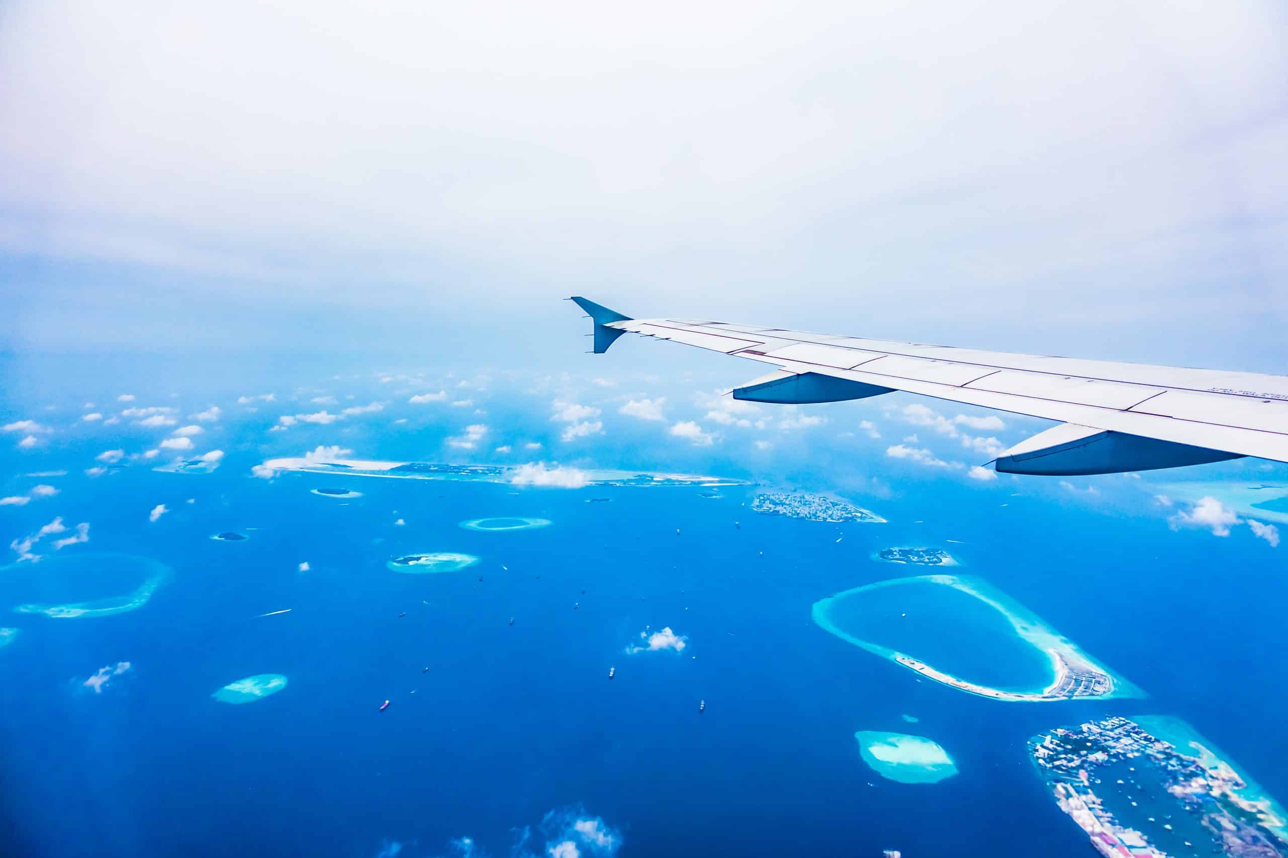 Passenger jet on final approach low over the sea